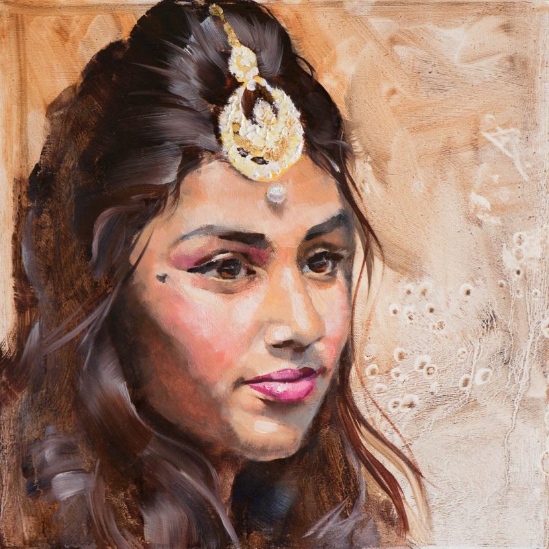Portrait of Amarya. An oil painting portrait of a young Indian girl wearing her tradition jewelry.
